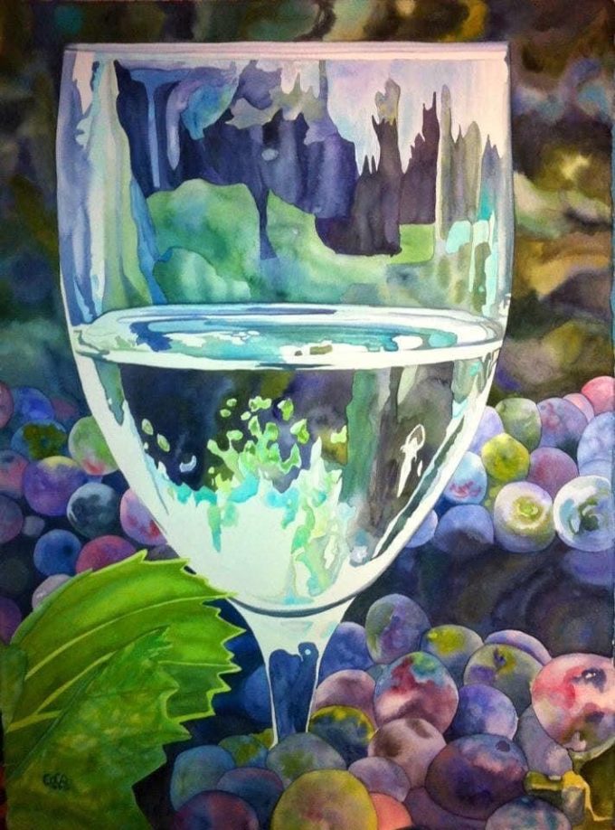 wine glass among the grapes